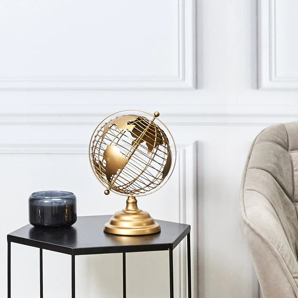 Globe terrestre en métal doré